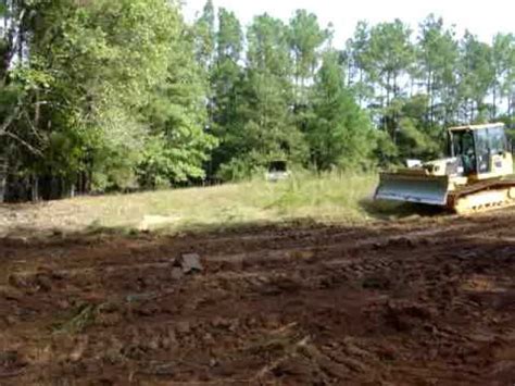 stripping topsoil with skid steer|top soil stripping thread.